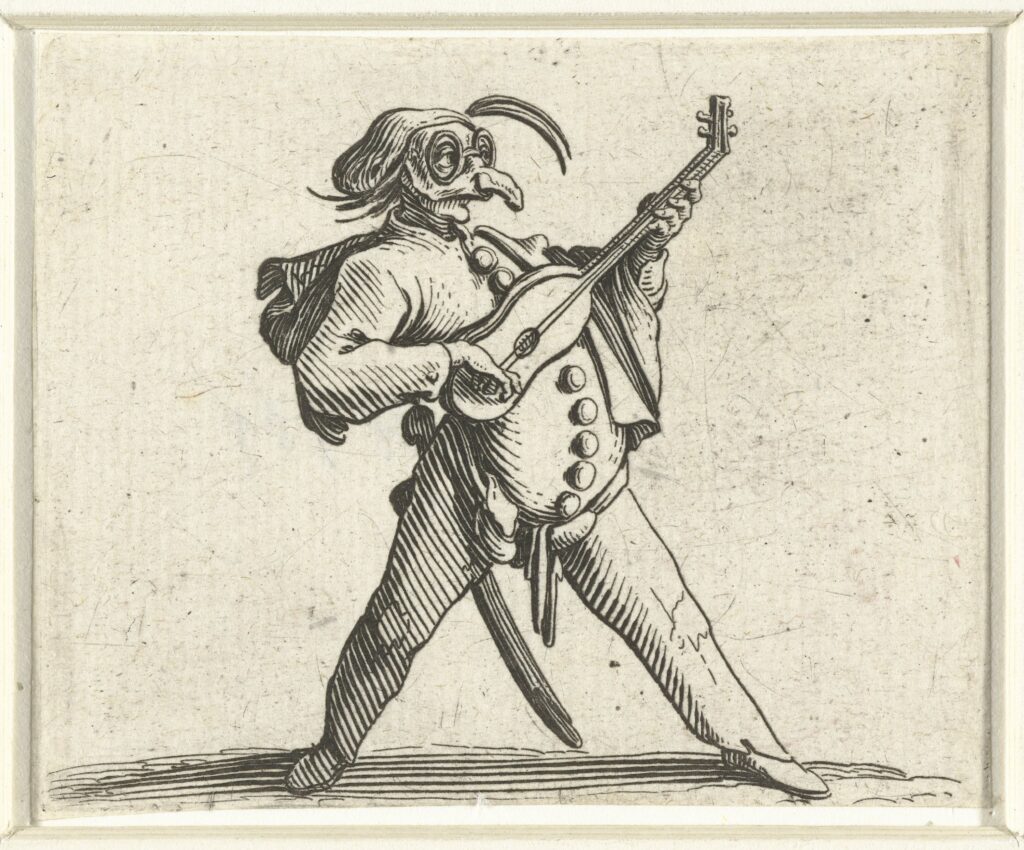 Man in a costume playing a stringed instrument. 